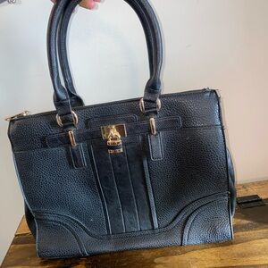 Sondra Robert’s Black Leather Bag Purple Interior Purse